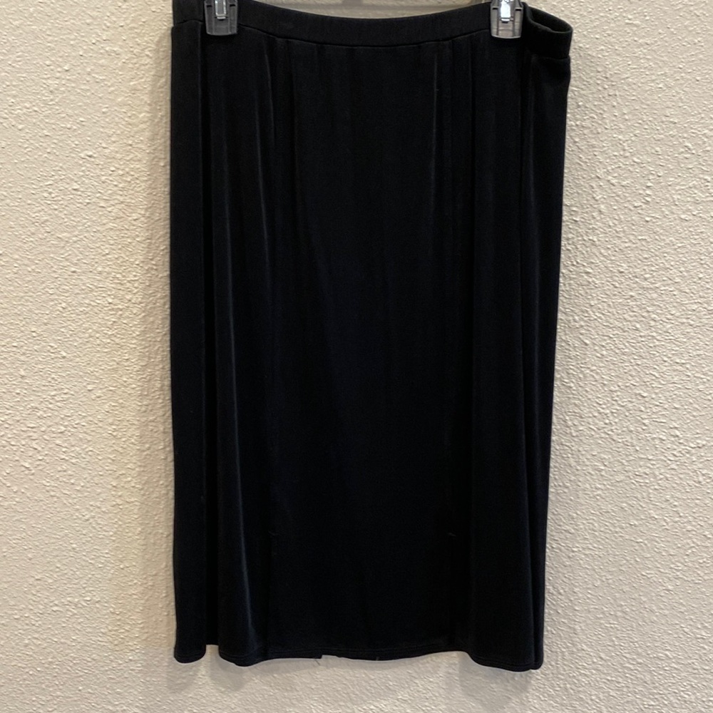Cute Chico’s black traveler’s skirt.  Cutout hemline XL